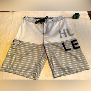 Hurley white and grey board shorts used in very great condition size 34